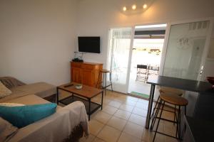 Maison d'angle climatisée dans résidence avec piscine commune , 4 couchages , 400 m de la plage de PORTIRAGNE LRJP121