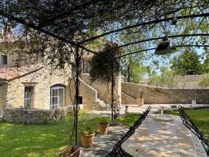 Mas au centre du village de Lussan - 6 personnes - Piscine