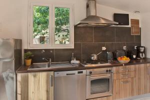 minivilla lilas indépendante à Calvi avec jardin et piscine jardin et bbq