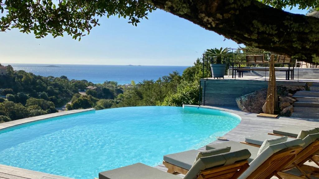 Villa Superbe villa avec piscine chauffée et vue mer à Palombaggia de Porra 20137 Porto-Vecchio