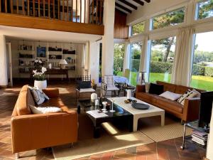 Villa chaleureuse avec vue imprenable sur le lac.