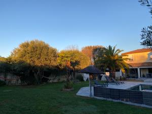 Villa Villa climatisée avec piscine, jardin paysagé entièrement clos et terrain de pétanque 187 Rue Montée Rouge 30310 Vergèze Languedoc-Roussillon