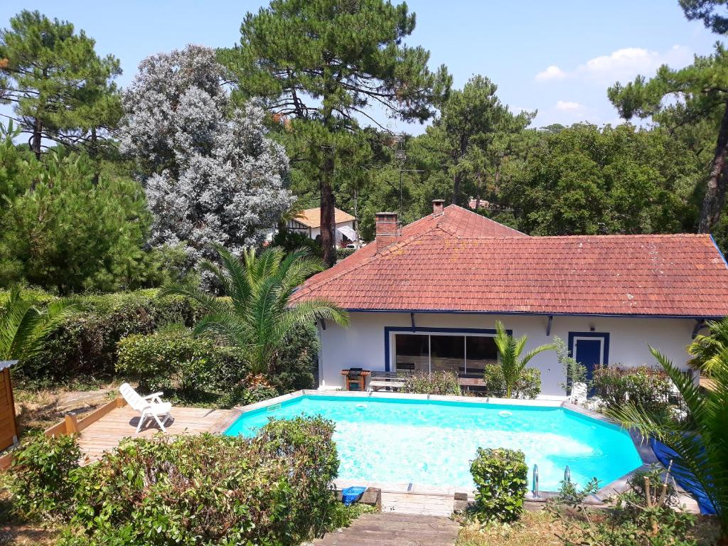 Villa L'OUSTAL avec piscine entre lac et océan pour 8-10 personnes 181, avenue des Capucines, 40150 Soorts-Hossegor