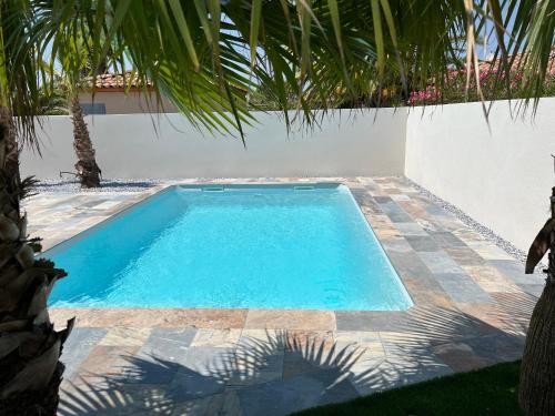 Villa les Palmiers au calme avec piscine