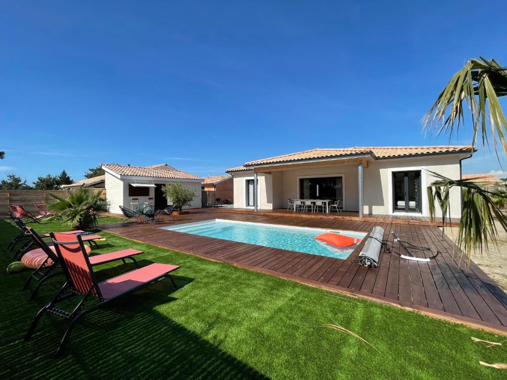 VillasHomeClet - Villa Palm Beach Rue des Alizés, 33590 Vensac