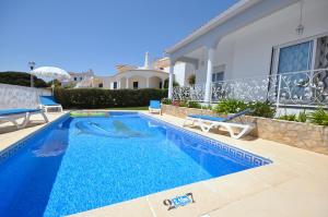 Villa Well-appointed villa is situated in the popular resort of Vilamoura Rua do Chile 8125-406 Quarteira Algarve