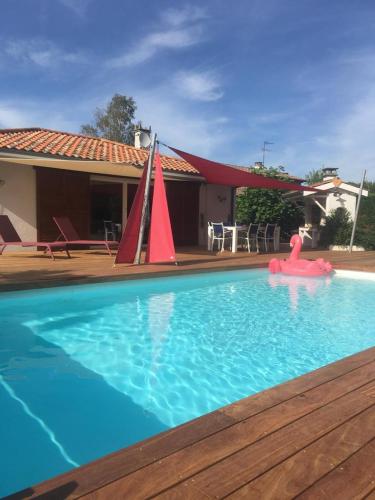 Maison de vacances Villa ZOGABY avec piscine chauffé et tarrasse bois plein sud 26 Avenue des Abeilles Lège-Cap-Ferret