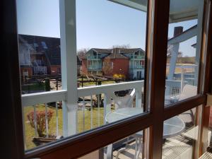 Ferienwohnung 4 im Haus am See mit Wintergarten und Terrasse