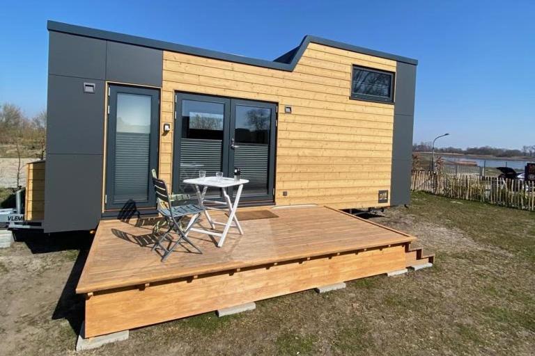 Maison de vacances Winzig Wohnen Tiny House direkt am Weserstrand 1 Am Weserufer, 26931 Elsfleth